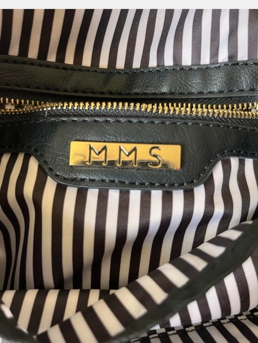 MMS Design Studio Black Nylon Backpack with Gold Accents